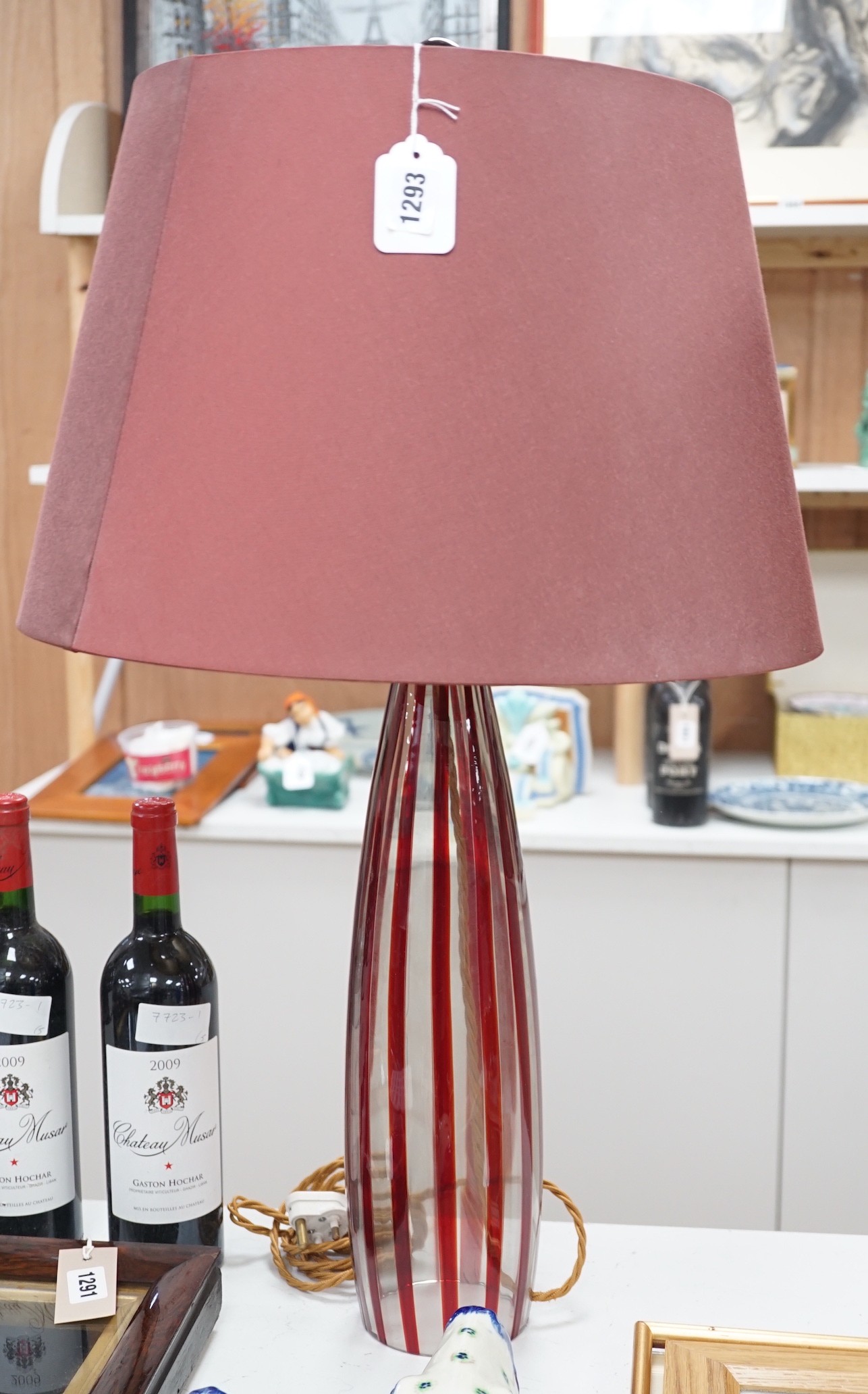 A pair of Murano style red stripe glass table lamps, 76cms high including shades